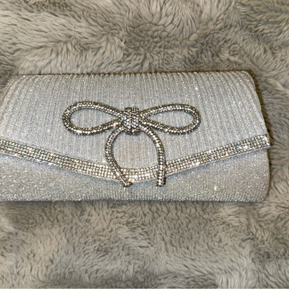 Elegant Silver Clutch with Rhinestone Bow